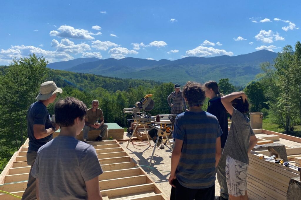 Students visiting a new building site in Easton with Adam Nyborg Environmental Building.
